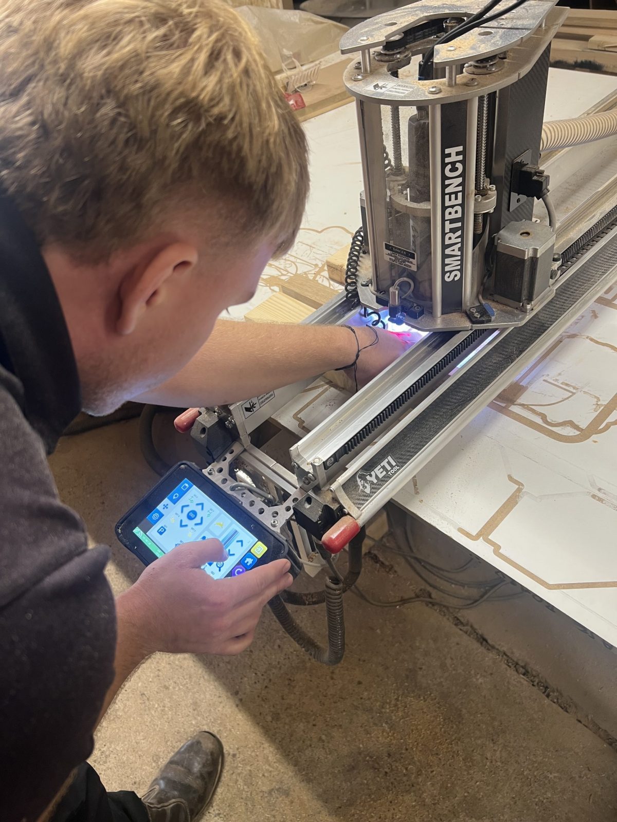 CNC machining in progress at KMP Carpentry & Joinery workshop — precision cutting for custom wooden designs.