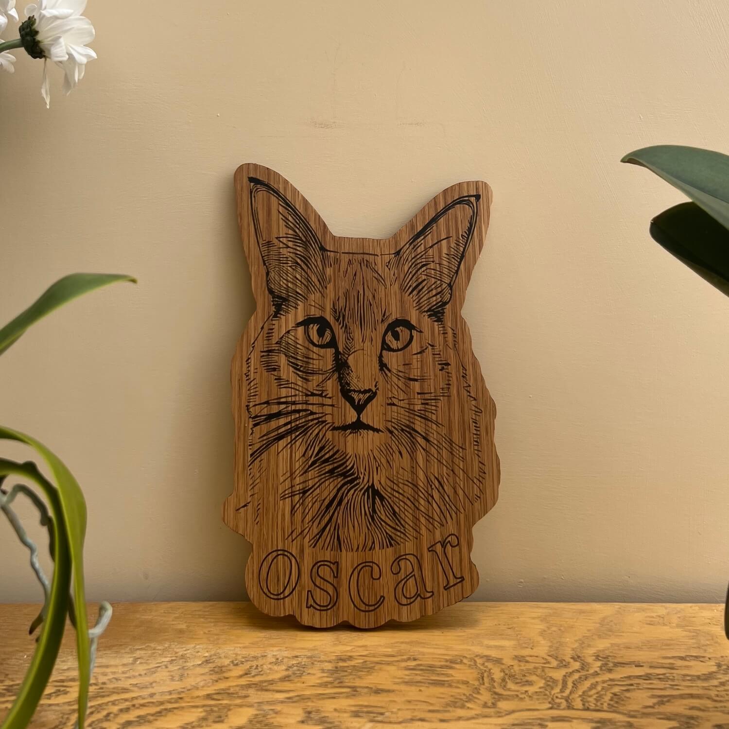 Engraved wooden cat plaque – custom oak pet portrait sign.