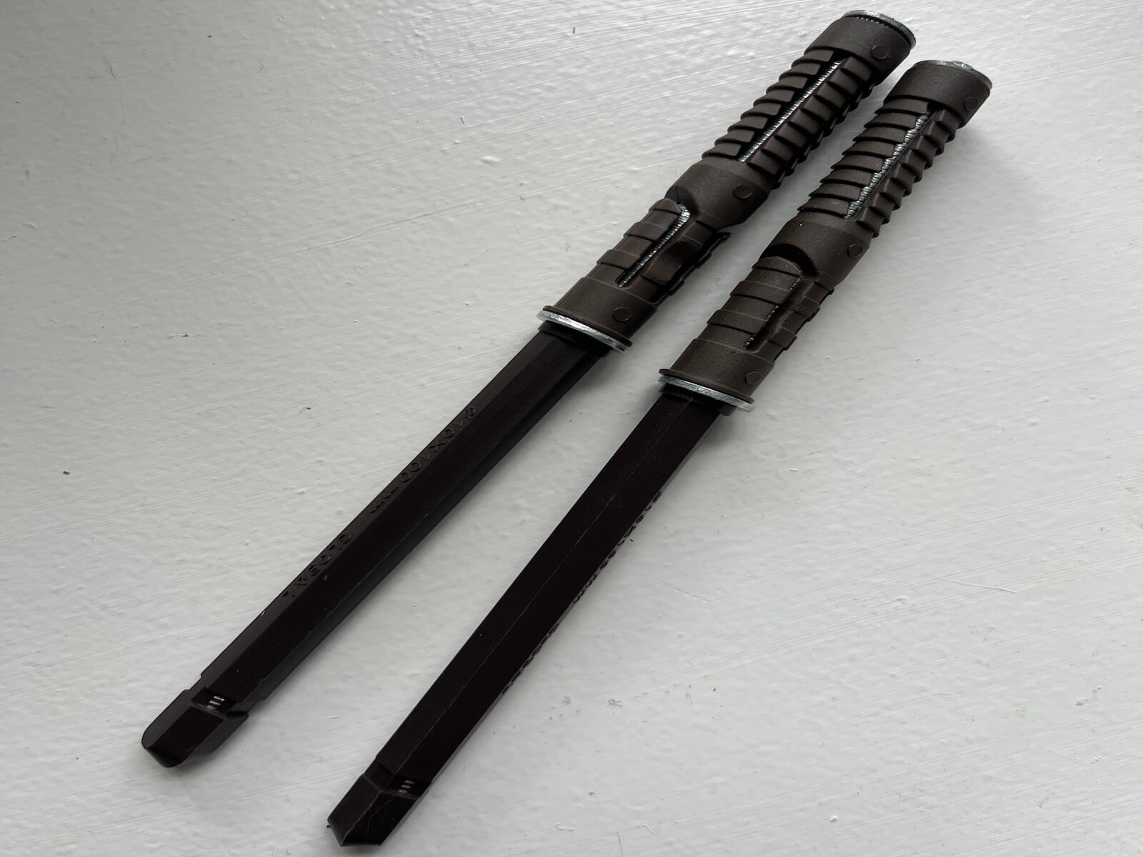 Pair of concealed wall mounting brackets for floating oak shelf.