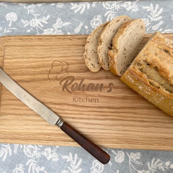 Personalised solid oak chopping board engraved with name, handcrafted in Cambridgeshire UK.
