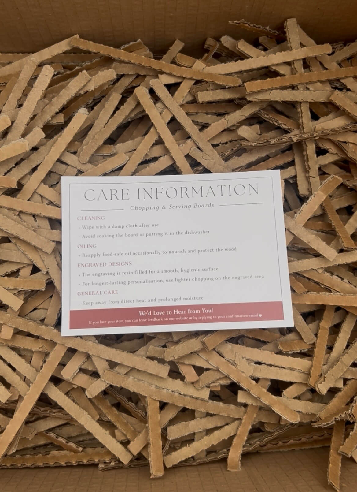 Eco-friendly packaging with FSC-certified cardboard and care instructions for personalised wooden gifts.