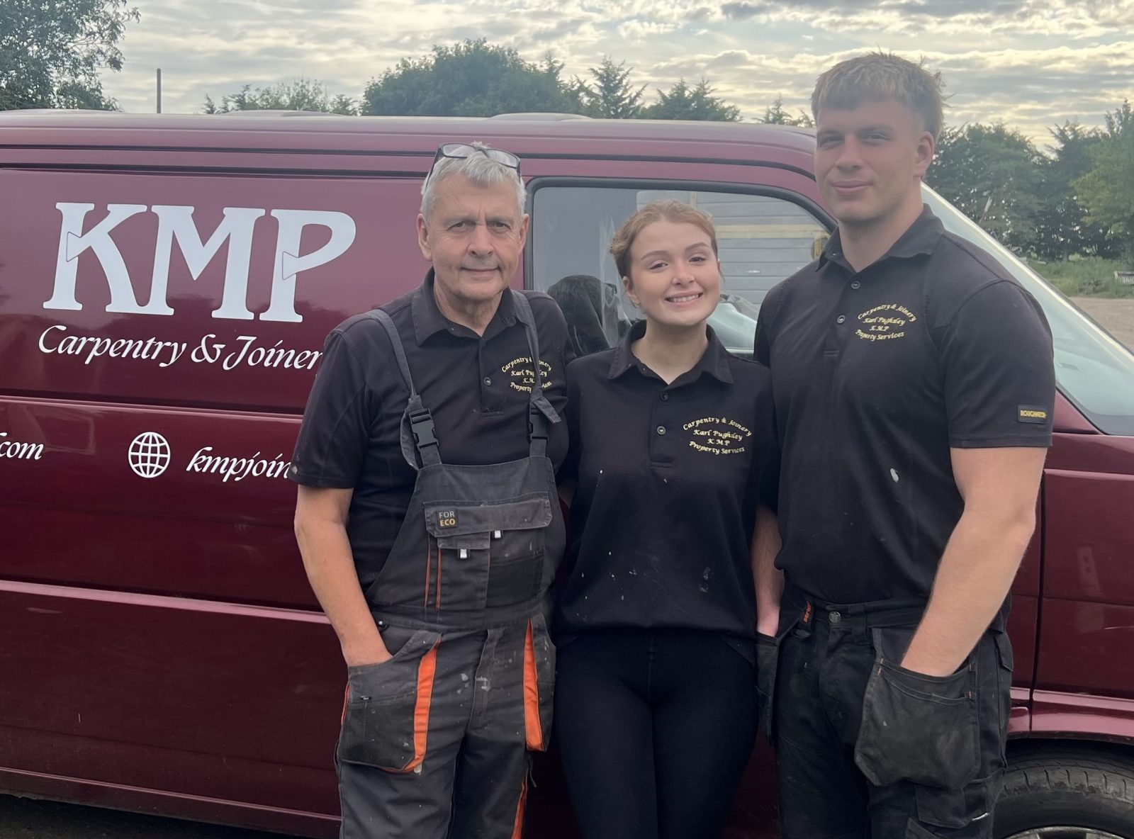 The KMP Carpentry & Joinery team outside their Cambridgeshire workshop van.