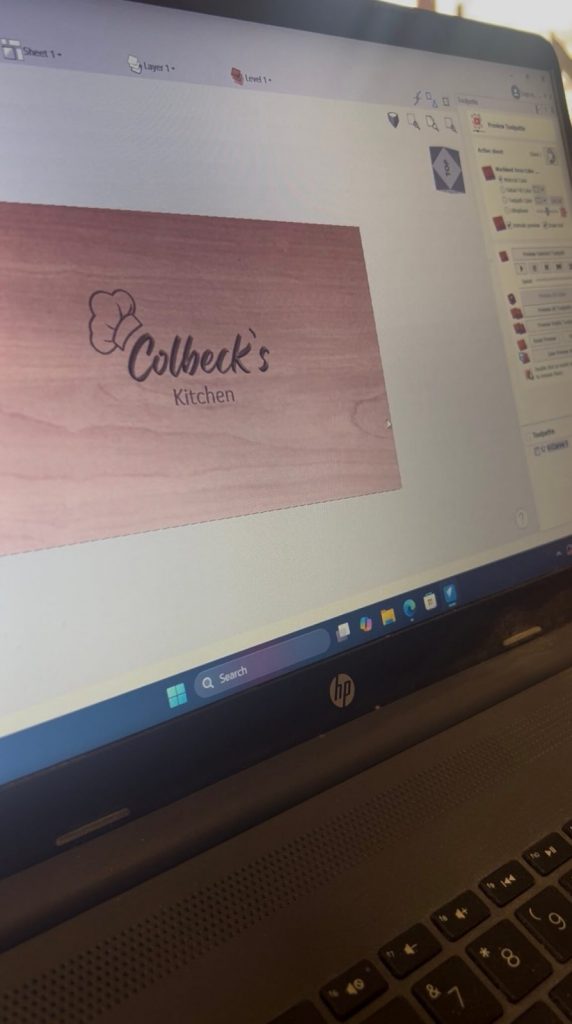 VCarve digital layout showing the personalised engraving design before CNC carving a custom oak chopping board.