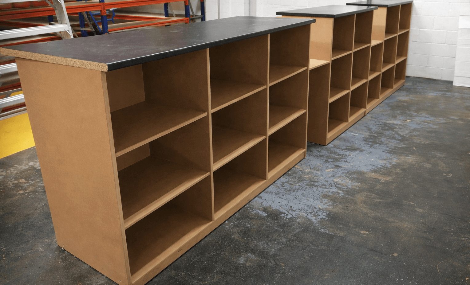 Custom commercial shelving and counter units built for retail installation in Cambridgeshire.