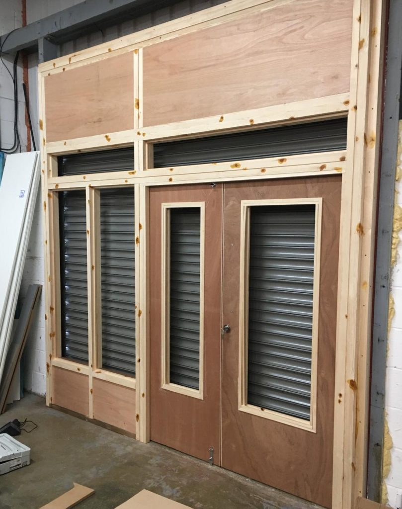 Timber shop front installation for a retail fit-out.