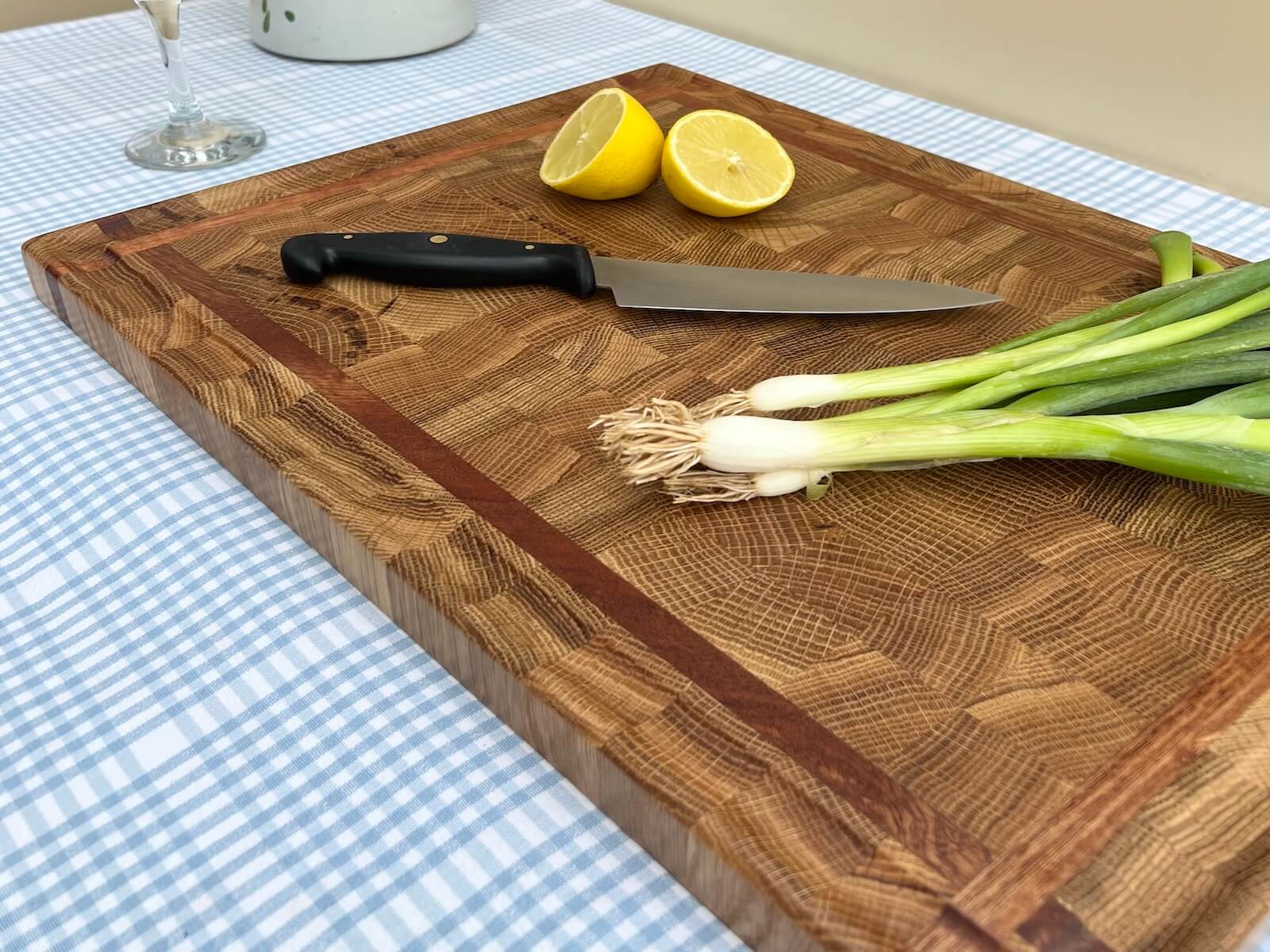 Framed end grain oak chopping board with sapele border, handcrafted UK.