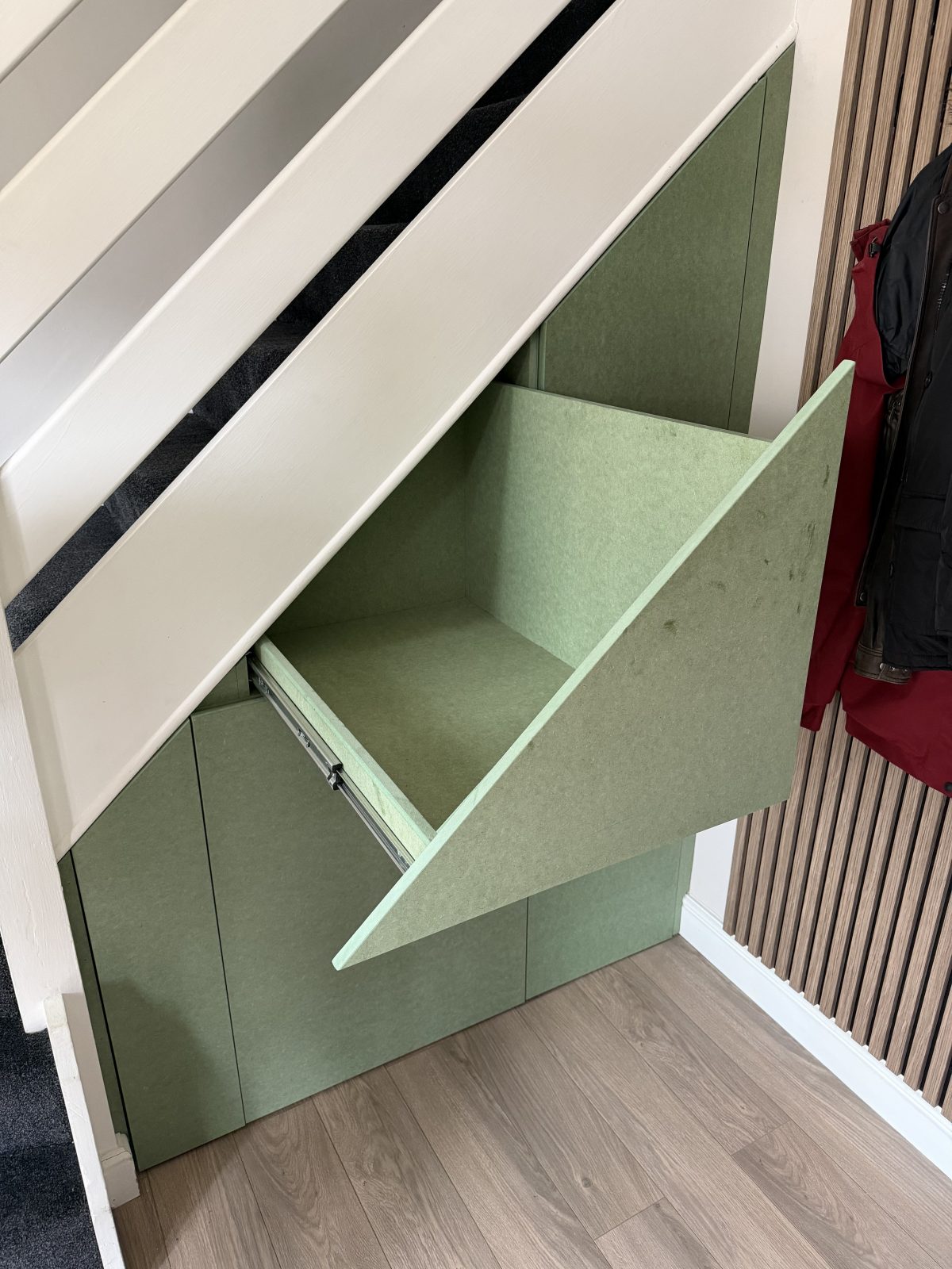 Built in understairs drawers with push to open system Cambridgeshire.