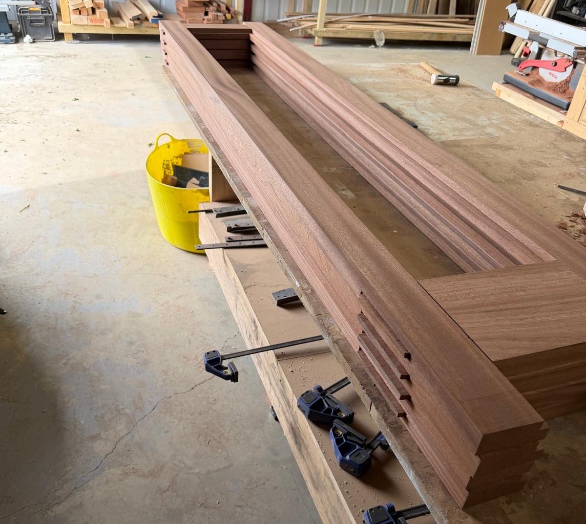 Solid sapele hardwood bi-fold door panel being constructed using traditional mortise and tenon joinery.