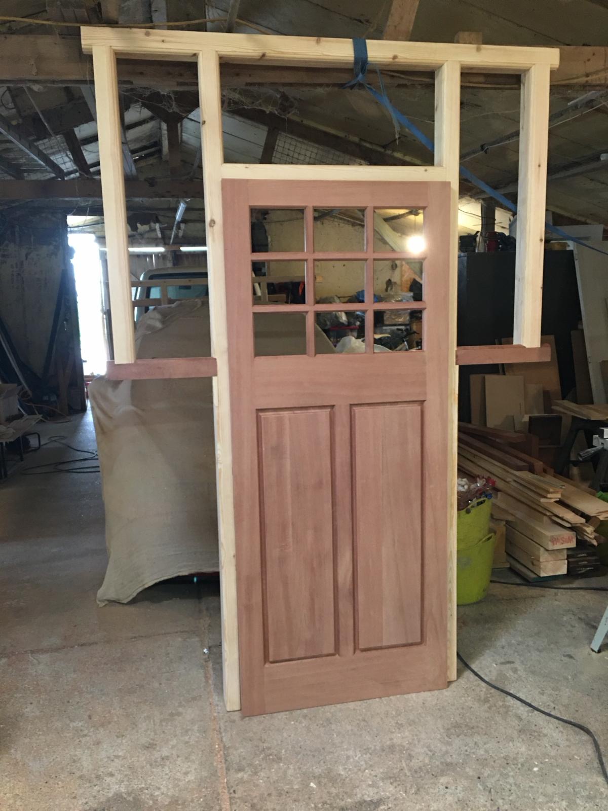 Bespoke traditional timber entrance door handcrafted in our Cambridgeshire joinery workshop before finishing.